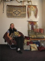 Rita Baker with some of her traditional Maori Flax weaving artworks.